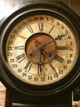 Old clocks on the brick wall Stock Photos