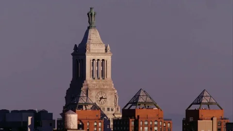 Old clocktower set against clear sky. Stock Footage 78808008