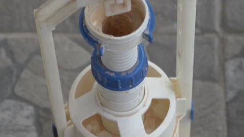 Old Close-up of a plastic toilet flush valve mechanism Video stock 331342293