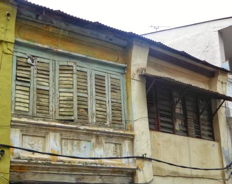Old closed window shutter, exterior, architecture in Malaysia Foto stock