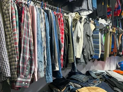 Old clothes in a second hand shop in Morocco Stock Photos