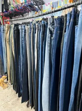 Old clothes in a second hand shop in Morocco Stock Photos