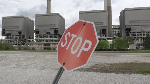 Old coal fired electrical power plant generating station being torn down Stock-Footage 153931323
