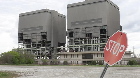 Old coal fired electrical power plant generating station being torn down Stock Footage 153936346