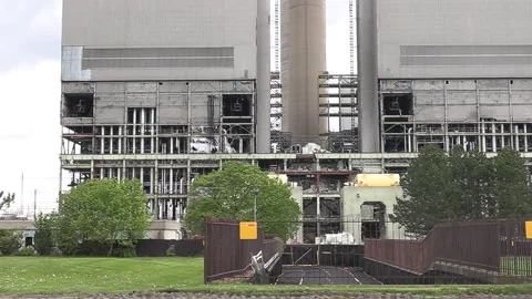 Old coal fired electrical power plant generating station being torn down Stock-Footage 153939296