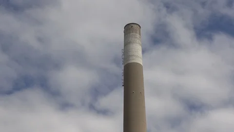 Old coal fired power generating plant closed and boarded up Stock Footage 114717432