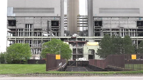 Old coal powered electrical power generating station being torn down Stock-Footage 153944291