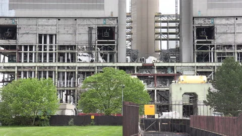 Old coal powered electrical power generating station being torn down 스톡 동영상 153952251