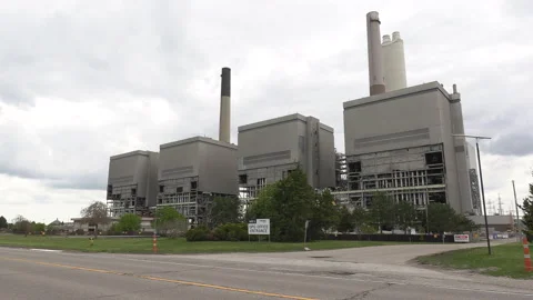Old coal powered electrical power generating station being torn down Stock-Footage 153961292