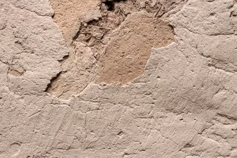 Old cob wall with cracked surface Stock Photos