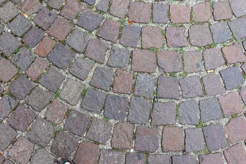 Old cobblestone pavement close-up background and texture Stock Photos