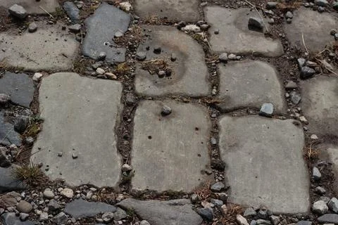Old Cobblestone Pavement Surface with Large Stone Blocks and Small Gravel Stock Photos