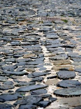 Old cobblestone paving on the sideway Foto stock