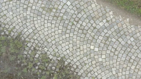Old cobblestone road over the bridge 4K aerial video Stock Footage 139465025
