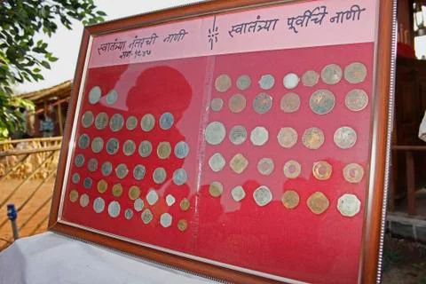 Old coins framed Stock Photos