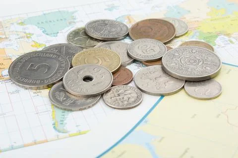 Old coins on map Stock Photos