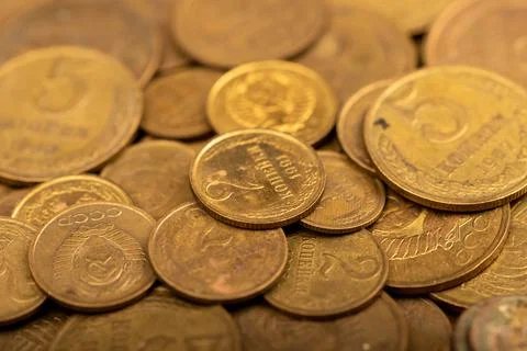 Old coins out of circulation in bulk, background image, close-up, selective f Stock Photos