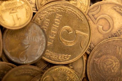 Old coins out of circulation in bulk, background image, close-up, selective f Foto stock