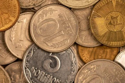 Old coins of the USSR in bulk on a flat surface, background image. Stock Photos