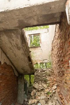 An old, collapsed building of Soviet army base in Latvie, Europe. Stock Photos
