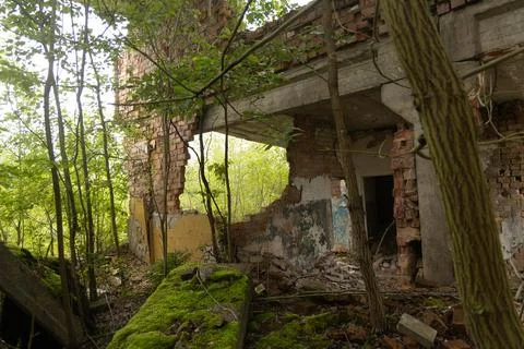 An old, collapsed building of Soviet army base in Latvie, Europe. Stock Photos