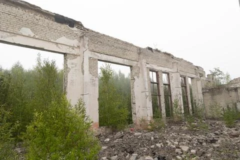 An old, collapsed building in soviet army base in Latvia, Europe. Stock Photos