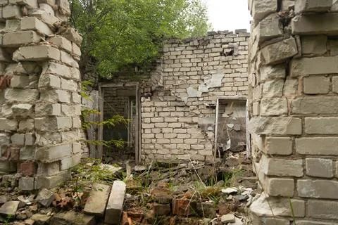 An old, collapsed building in soviet army base in Latvia, Europe. Stock Photos