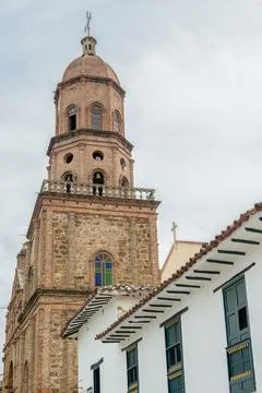 The old colonial style tower of the main church of the town of Curiti Foto stock