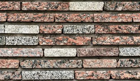 Old colored brick wall close up Stock Photos