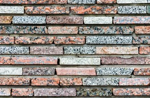 Old colored brick wall close up Stock Photos