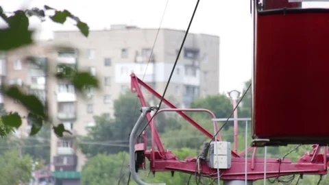 Old colored skyrail cableway in front of apartament house Stock Footage 78072585