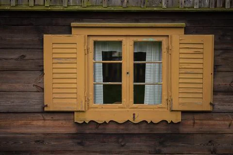 Old colored window with shutter Stock Photos