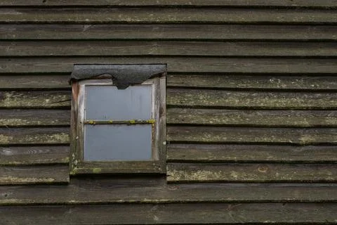 Old colored window with shutter Stock Photos