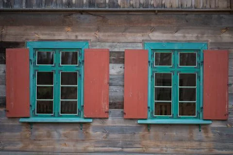 Old colored window with shutter Stock Photos