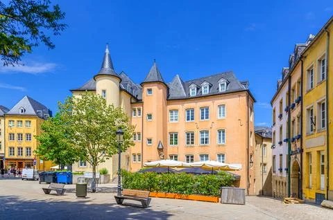 Old colorful buildings on small square in Luxembourg City historical centre V Stock Photos