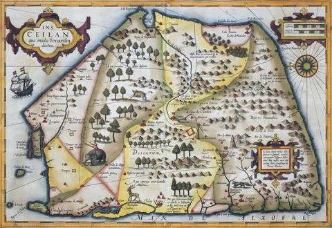 Old coloured map of Ceylon or Sri Lanka decorated with an elephant, a deer, a Stock Illustration