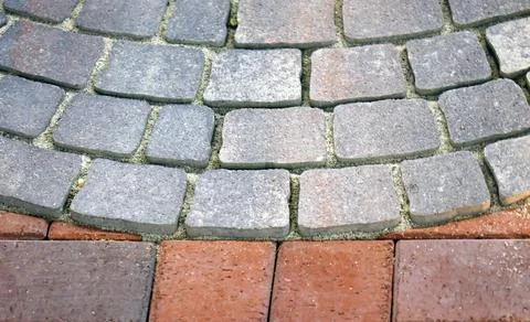 Old colourful cobble stone material on ground pattern background Stock Photos