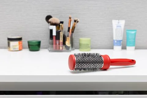 An old comb lies on the dressing table. red hair comb. Stock Photos