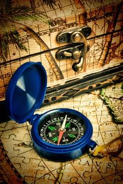 Old compass on the map Stock Illustration