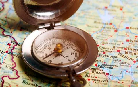Old compass on  map Stock Photos
