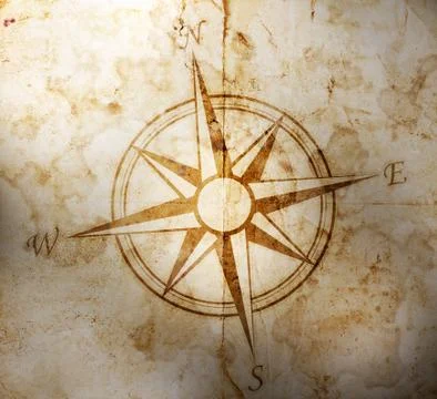 Old compass on paper background Stock Illustration