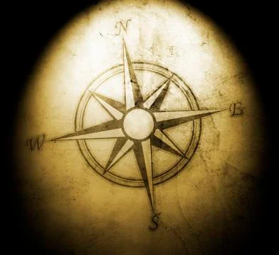 Old compass on paper background Stock Photos