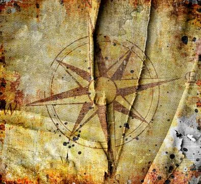 Old compass on paper background Stock Photos