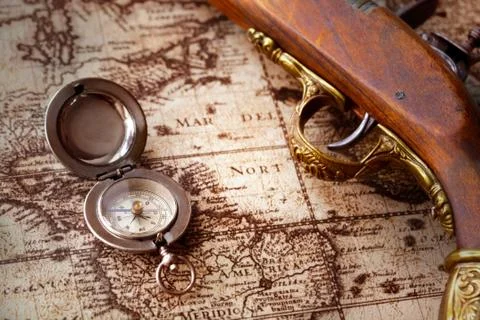 Old compass on vintage map Foto stock