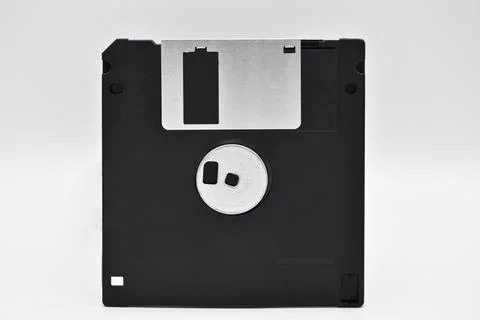 Old computer and data storage technology, black magnetic floppy disk 3 inches Stock Photos