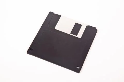 Old computer and data storage technology, black magnetic floppy disk 3 inches Foto stock