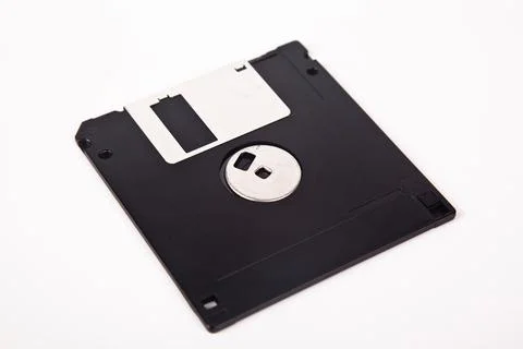 Old computer and data storage technology, black magnetic floppy disk 3 inches Stock Photos