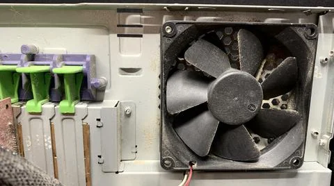 Old computer covered with dust is dismantled Stock Photos