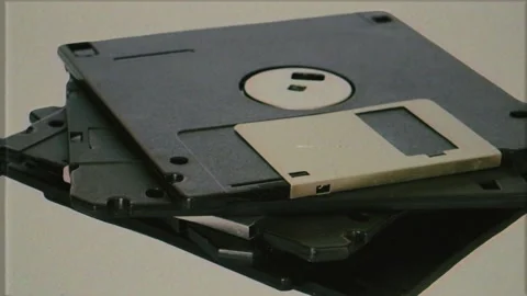 Old Computer Diskettes Vintage Technology Retro VHS Effect Zoom Out Stock Footage 267990797