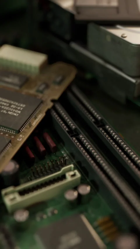 Old computer floppy disk and motherboard Stock Footage 276332937